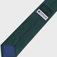 Green tie with a blue interior and 'SOPHOS' label on a light gray background