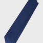 Navy blue tie on a light gray background
