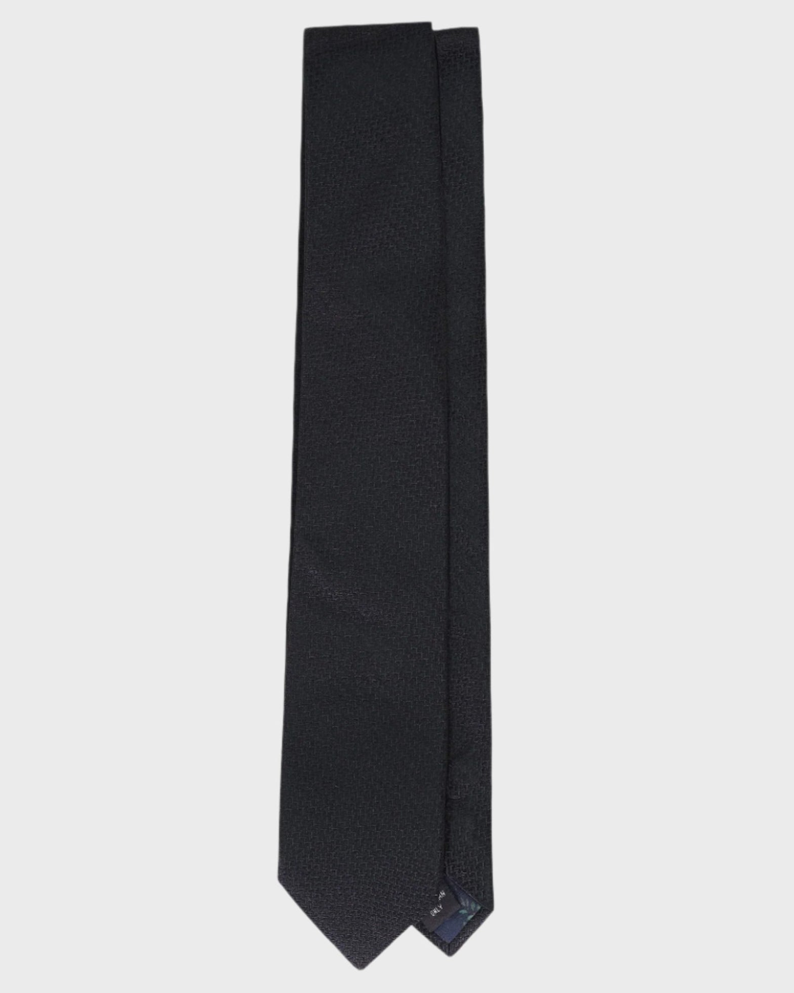 Black tie on a light gray background