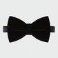 Black bow tie on a light gray background