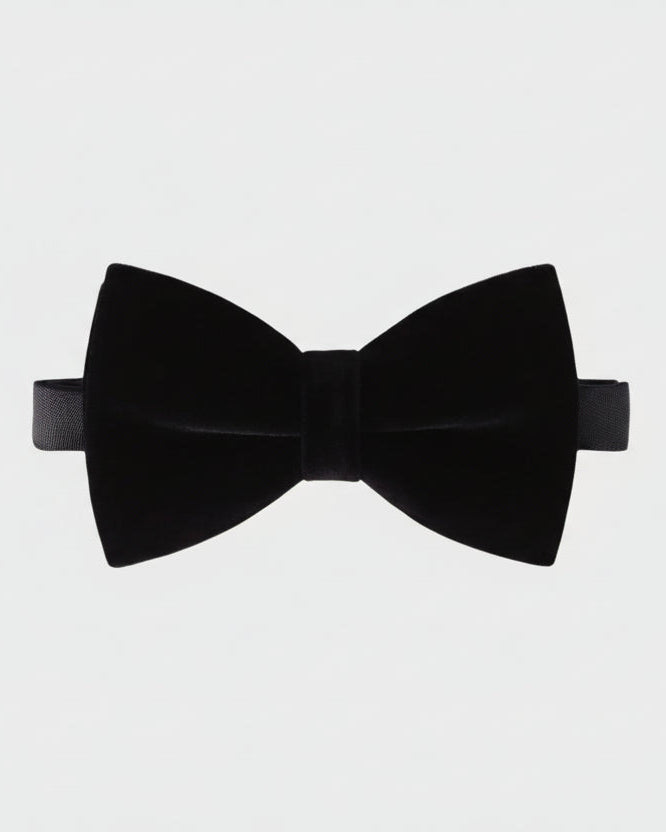 Black bow tie on a light gray background