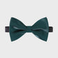 Green bow tie on a light gray background
