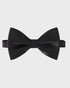 Black bow tie on a light gray background