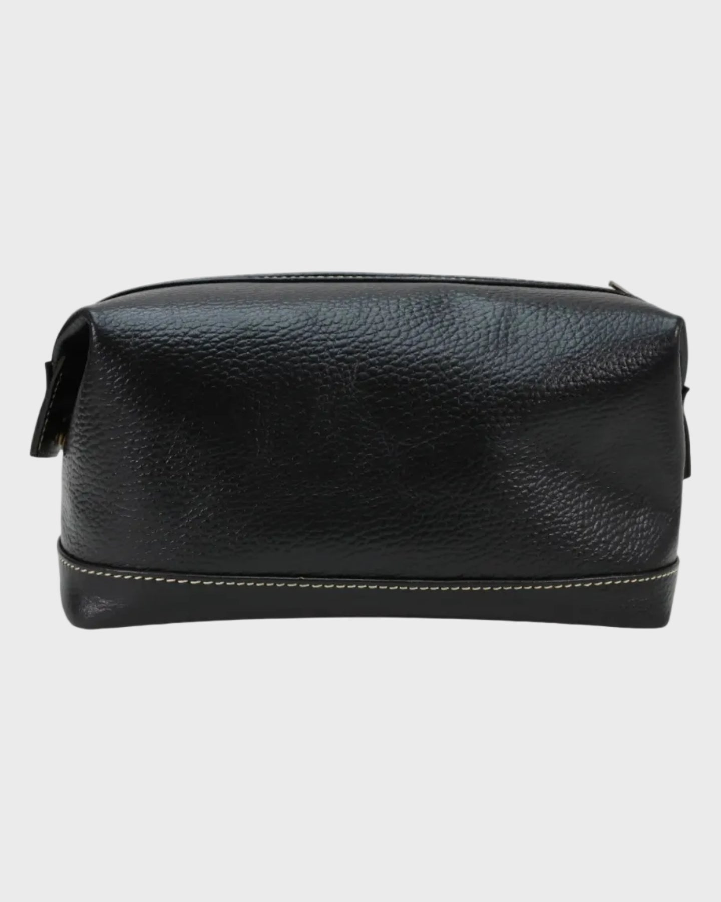 Black leather toiletry bag on a light gray background