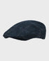 Blue tweed flat cap on a light gray background
