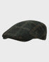 Harris Tweed flat cap on a light gray background