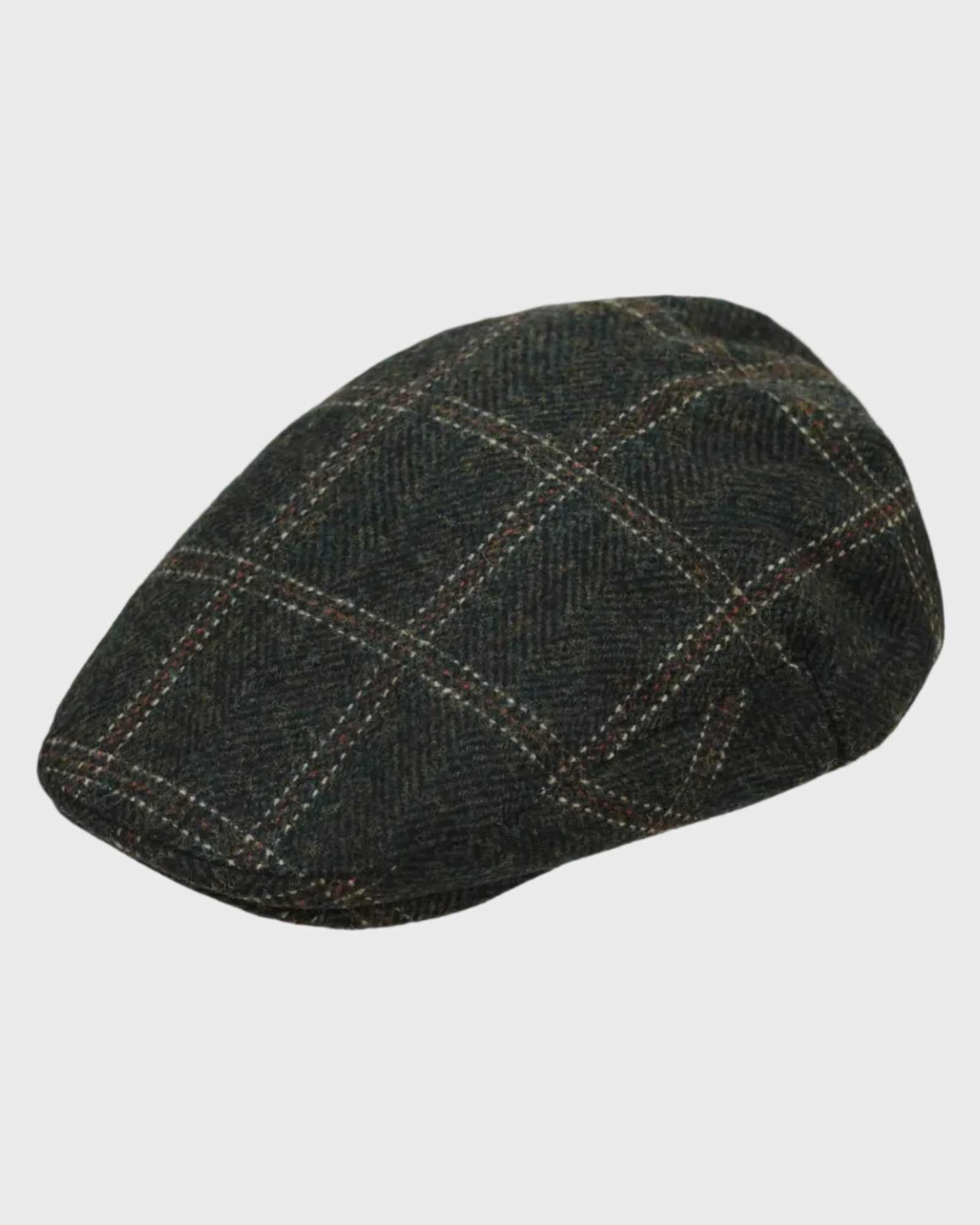 Flat cap on a light gray background