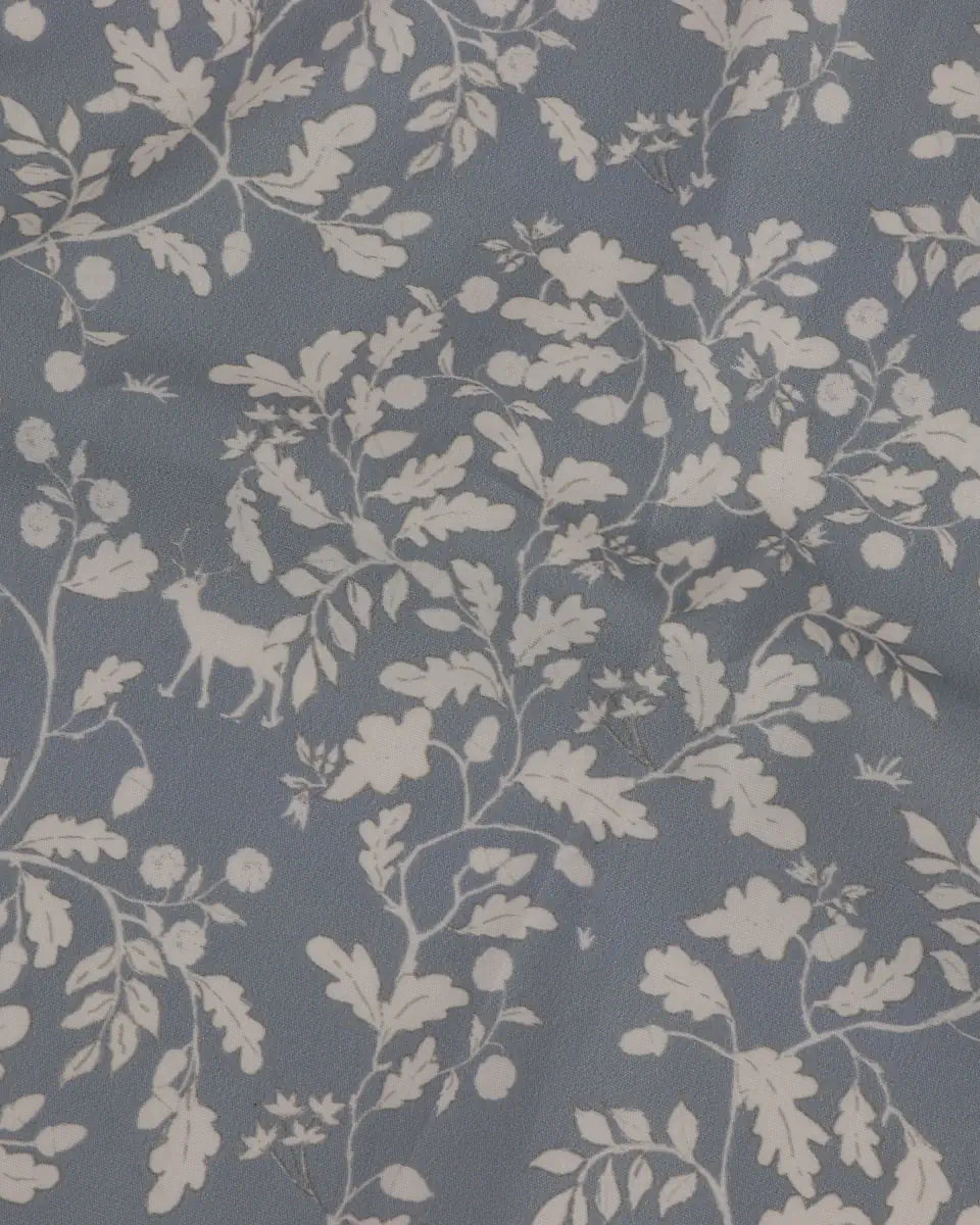 Light blue fabric with a white leaf pattern