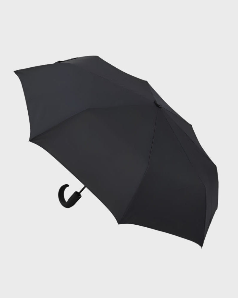 Black umbrella on a light gray background