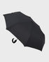Black umbrella on a light gray background
