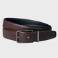 Brown leather belt with a silver buckle on a light gray background