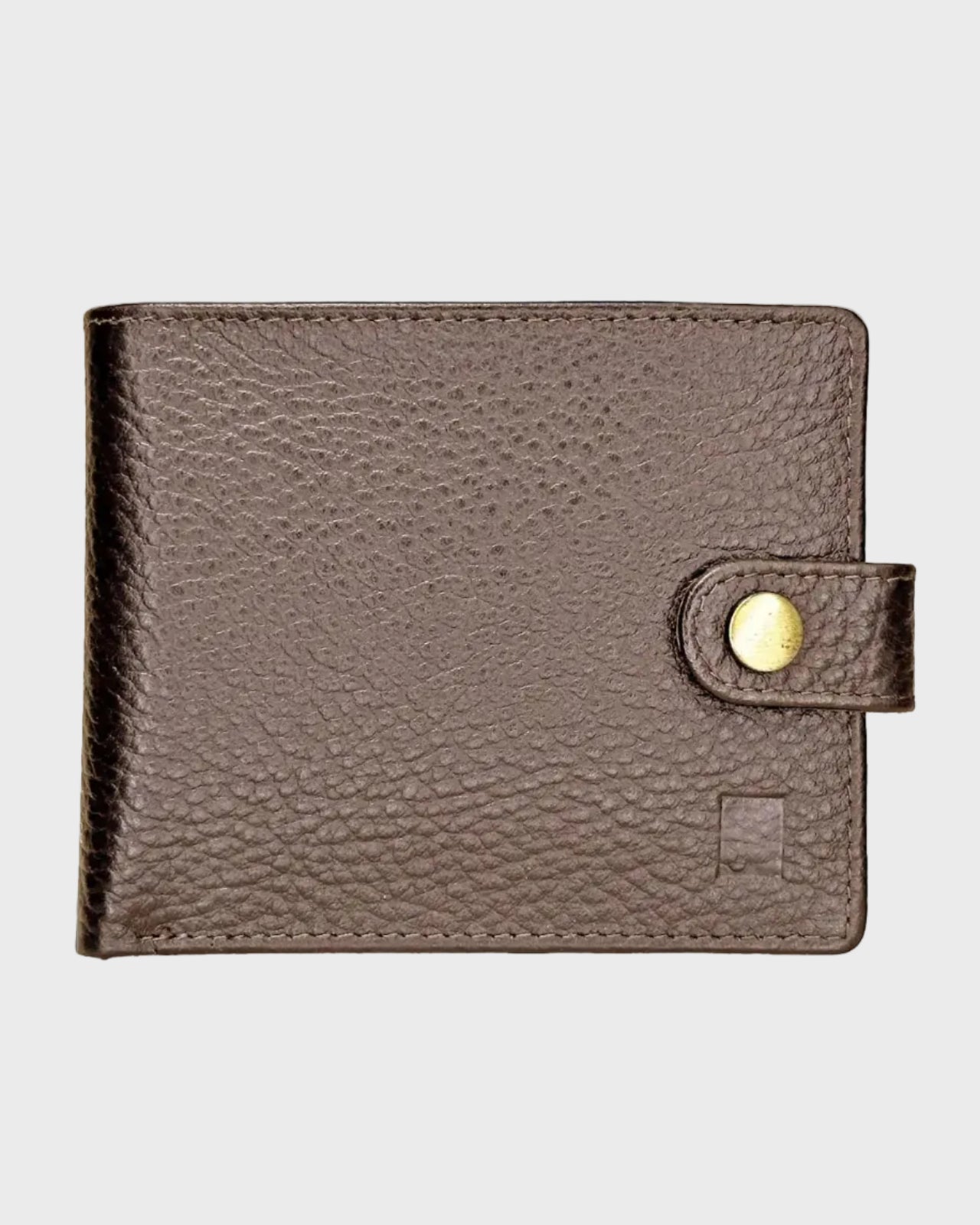 Brown leather wallet with a gold button on a light gray background