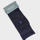 Dark blue sock with a small logo on a light gray background