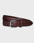 Brown leather belt on a light gray background