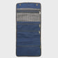Navy washbag on a light gray background