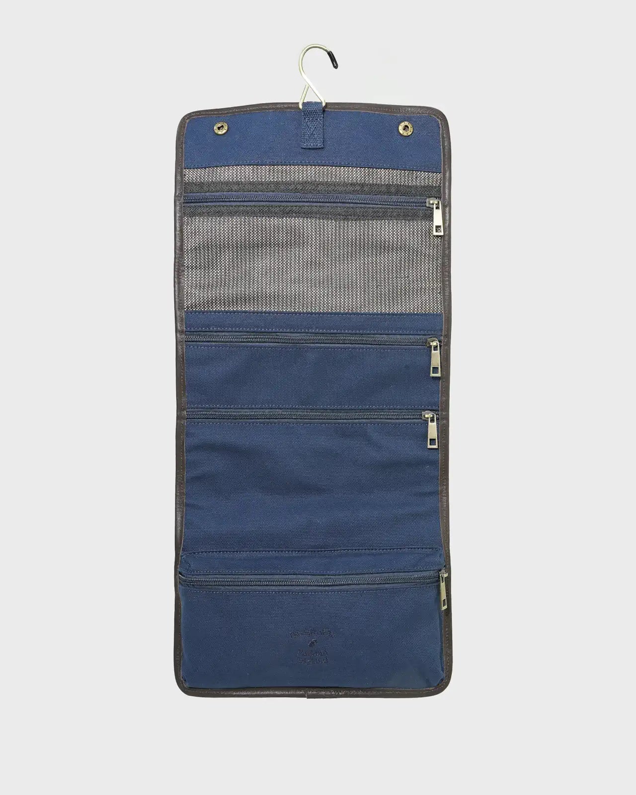Navy washbag on a light gray background