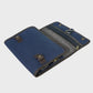 Navy washbag on a light gray background