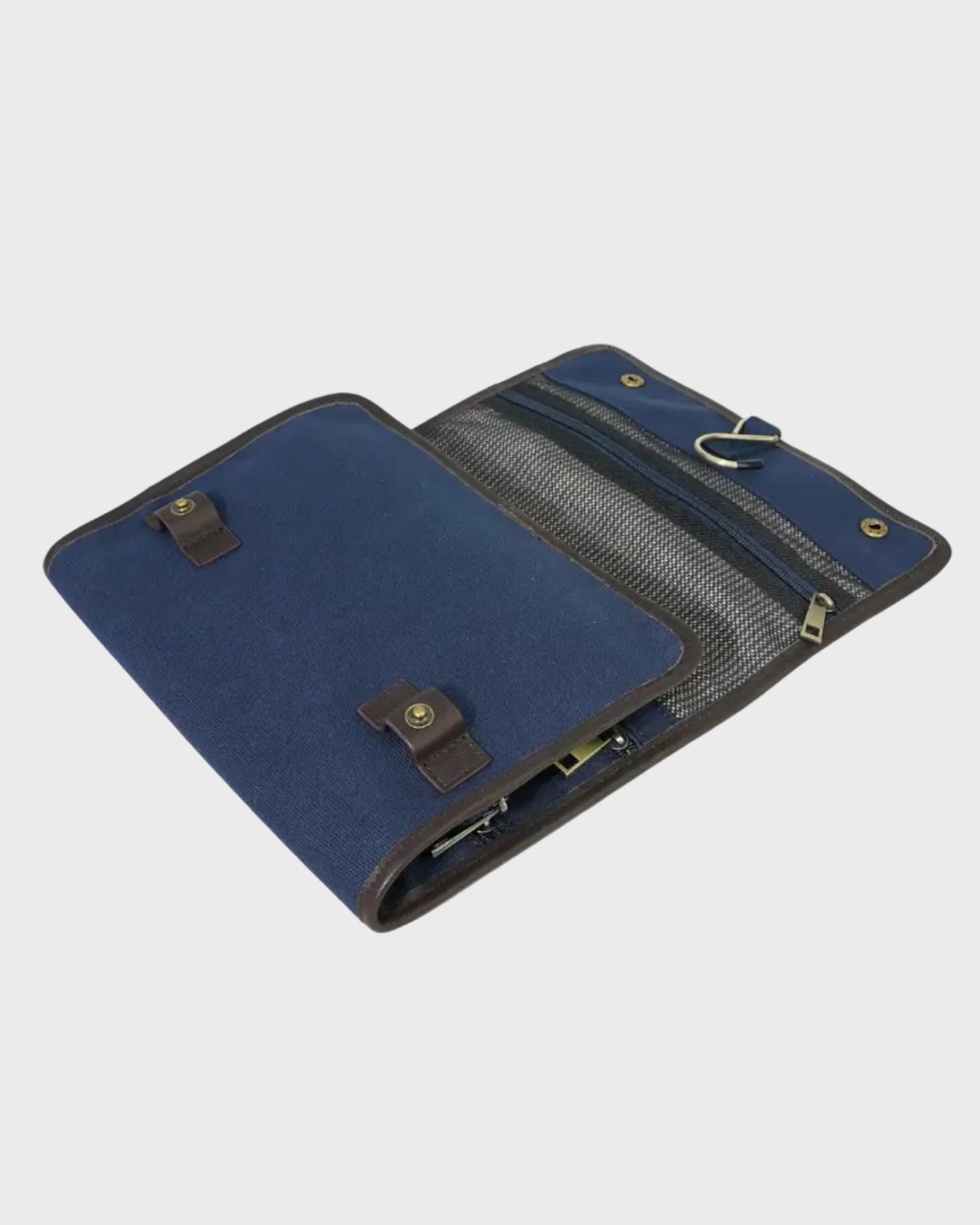 Navy washbag on a light gray background