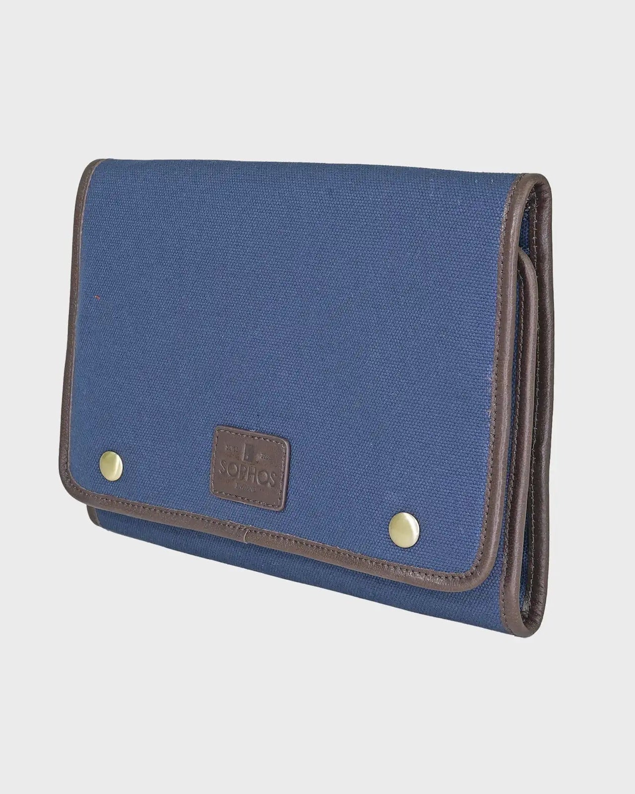 Navy washbag on a light gray background