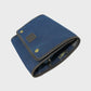 Navy washbag on a light gray background