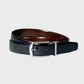 Black and brown belt with silver buckle on a light gray background
