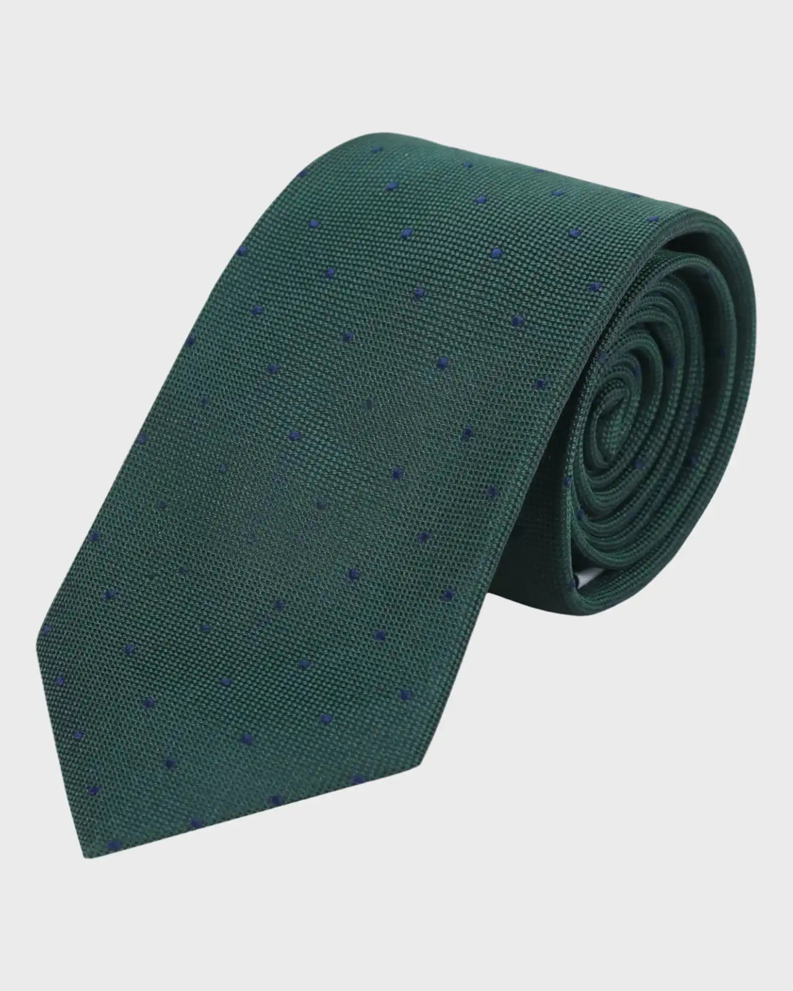 Green tie with subtle pattern on a light gray background